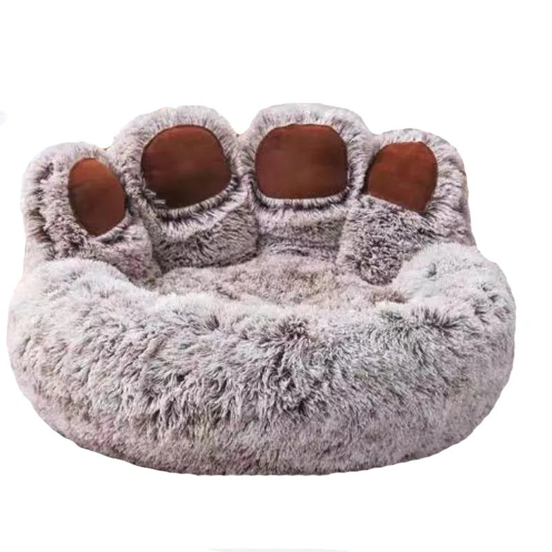 Ultra-soft plush paw-shaped pet bed from Furvio Shop, featuring cozy winter warmth and furry interior for small pets.
