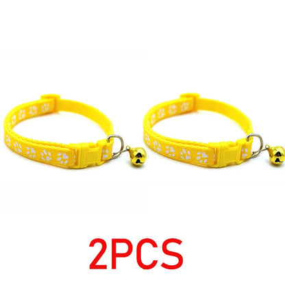 Reflective paw print breakaway dog collar from Furvio Shop, featuring a durable nylon strap with reflective paw print design.