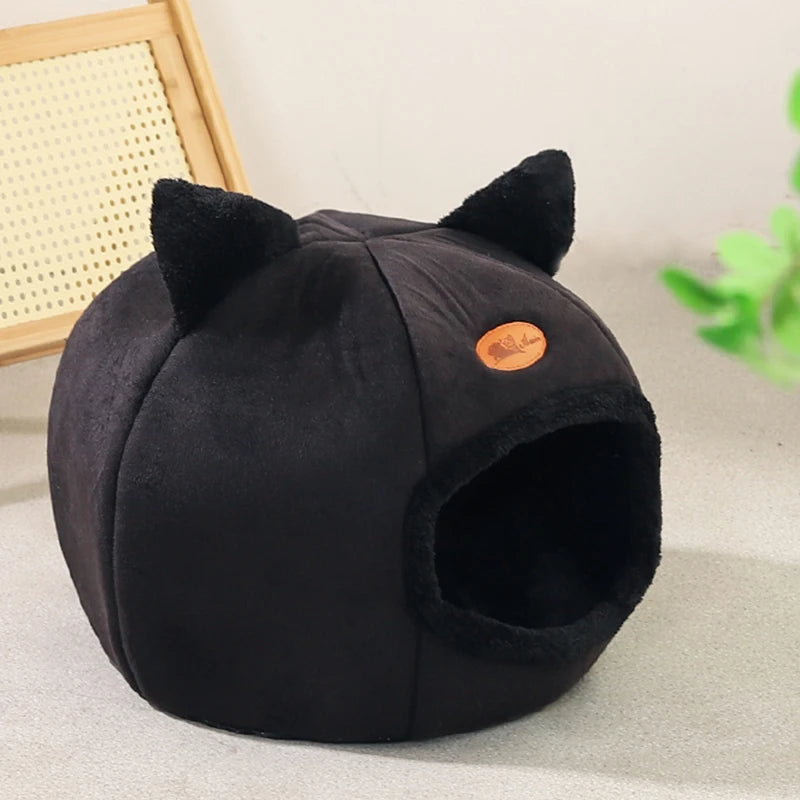 Furvio Shop 2-in-1 cat bed and nest in warm plush with a cozy cave design and soft fur interior for feline comfort.
