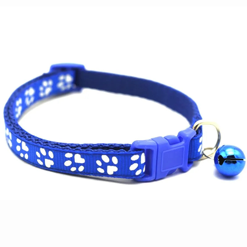 Reflective paw print breakaway dog collar from Furvio Shop with adjustable strap and safety release for pets.