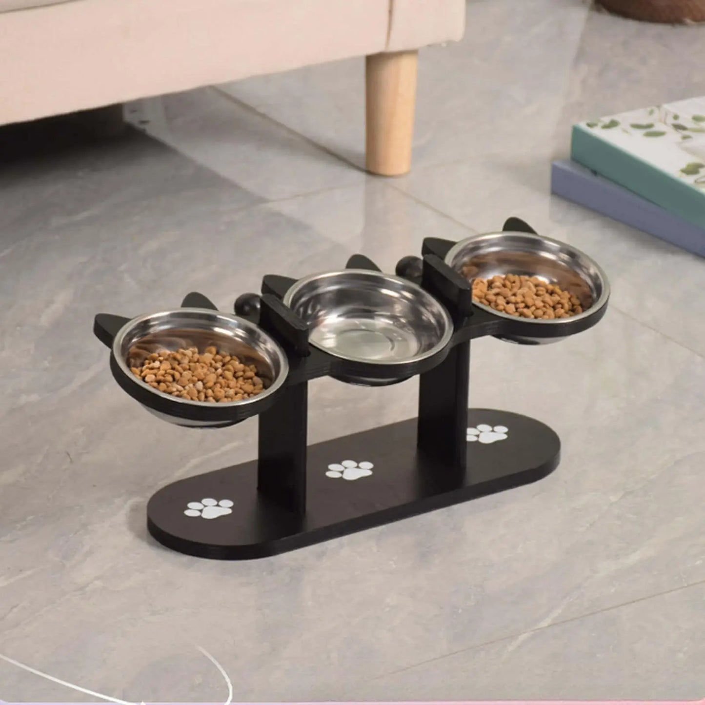 Elevated triple stainless steel cat bowl set by Furvio Shop with three feeding bowls on a raised stand for easy access.
