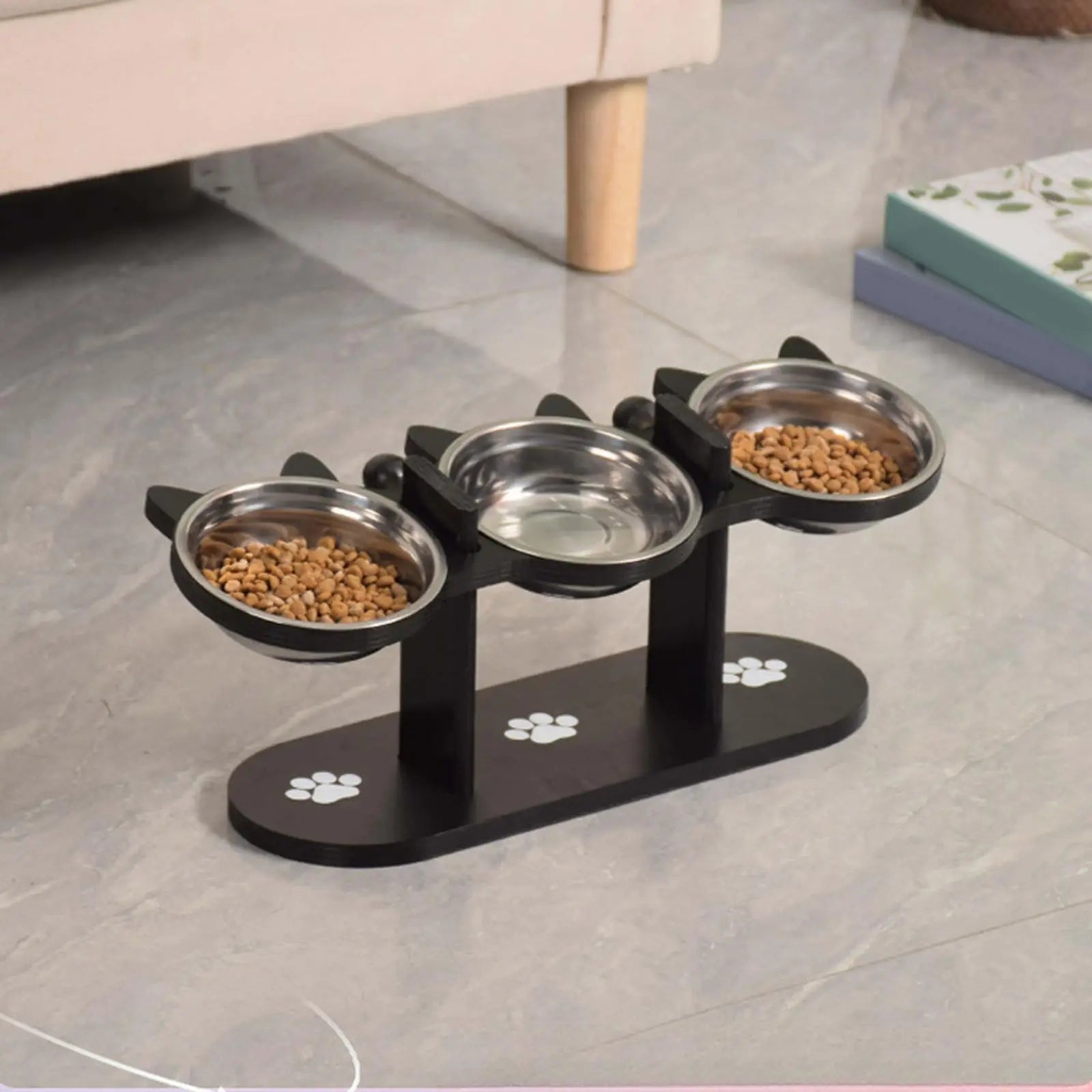 Elevated triple stainless steel cat bowl set by Furvio Shop with three feeding bowls on a raised stand for easy access.