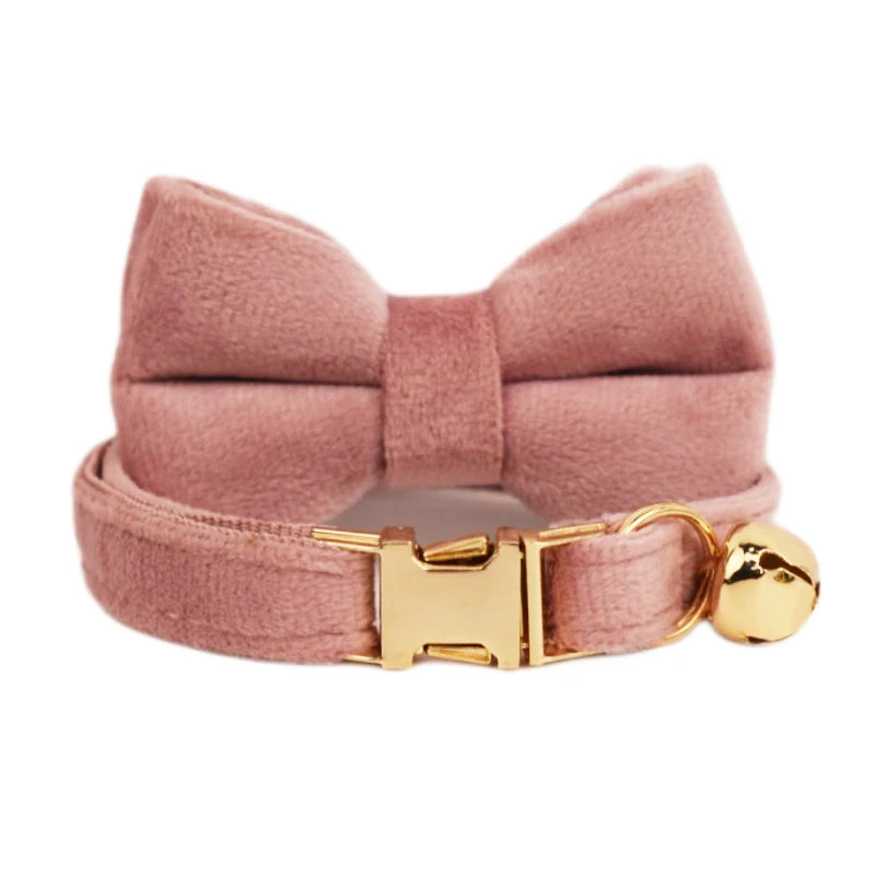 Luxury velvet cat collar with bow tie by Furvio Shop, featuring a soft velvet strap and decorative bow for stylish feline accessories.