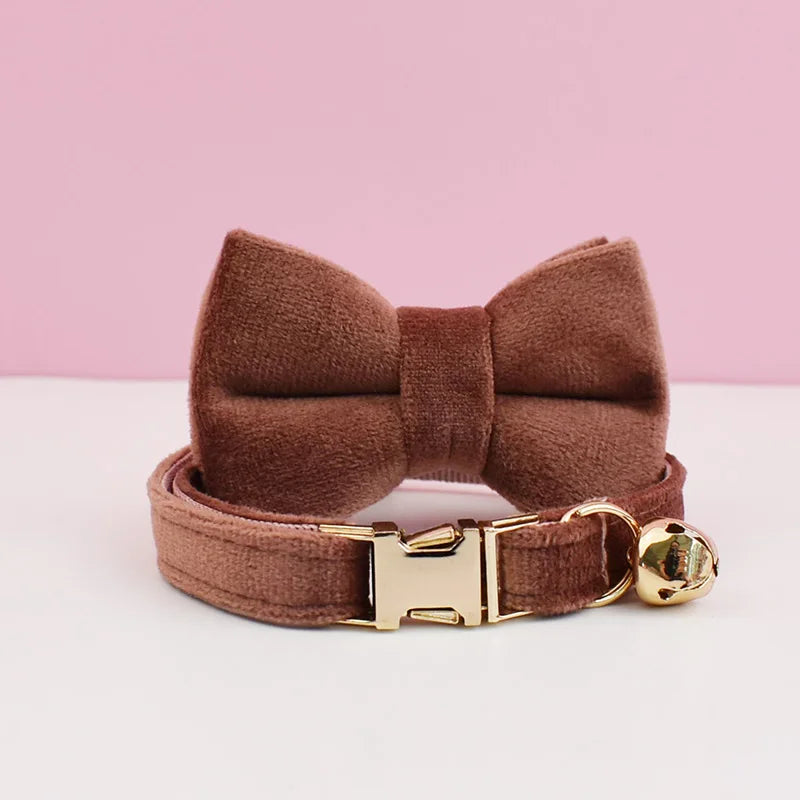 Luxury velvet cat collar with a bow tie by Furvio Shop, featuring a soft velvet strap and decorative bow for stylish feline accessories.
