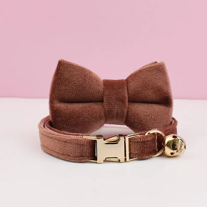 Luxury velvet cat collar with a bow tie by Furvio Shop, featuring a soft velvet strap and decorative bow for stylish feline accessories.