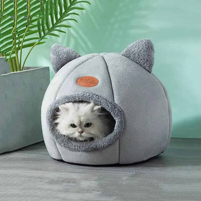 Furvio Shop 2-in-1 cat cave bed and nest with warm plush interior, featuring a cozy, fur-lined design for feline comfort.
