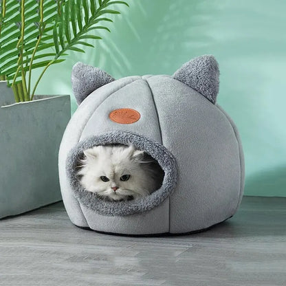 Furvio Shop 2-in-1 cat cave bed and nest with warm plush interior, featuring a cozy, fur-lined design for feline comfort.