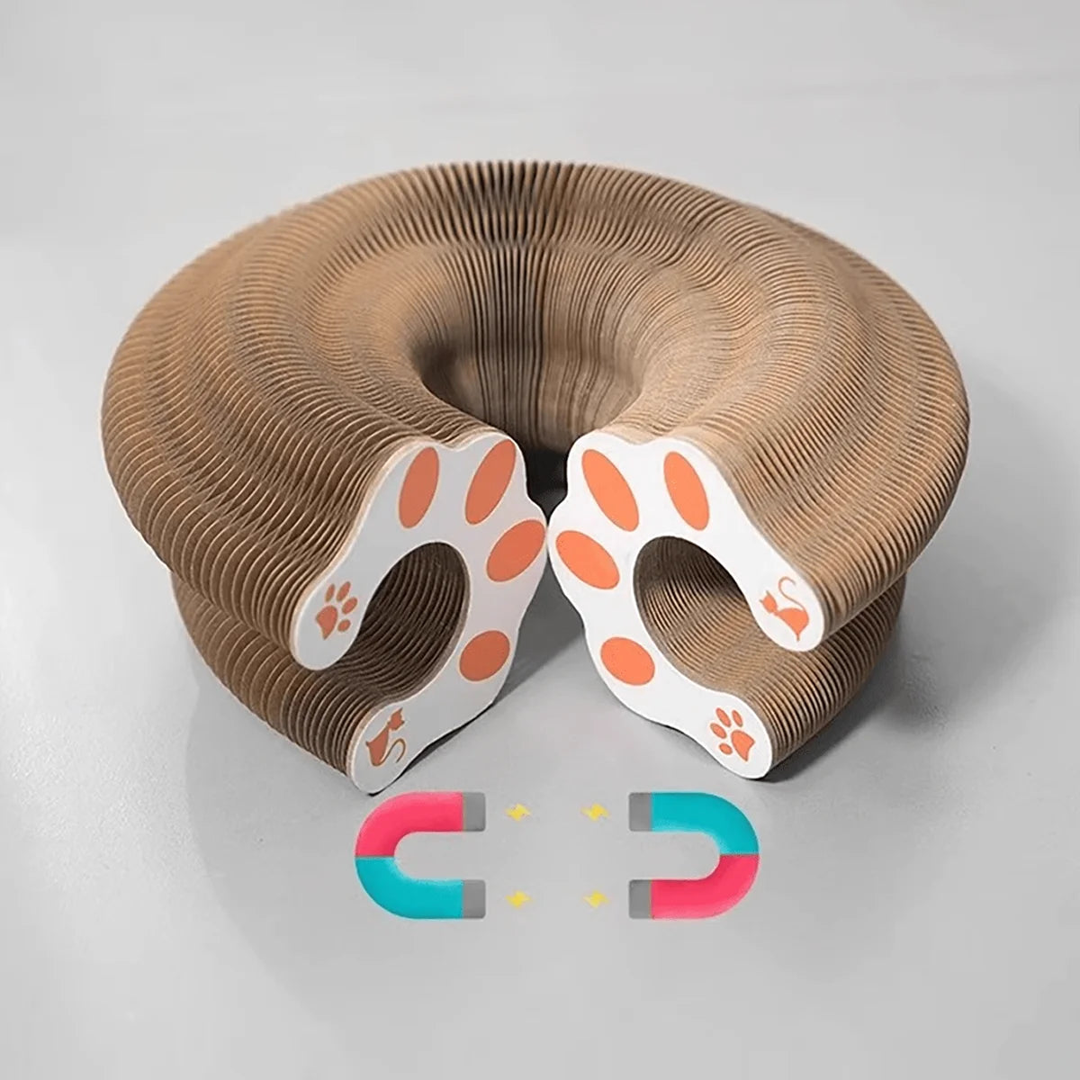 Transformable accordion cat scratcher and ball track by Furvio Shop, featuring colorful cardboard surfaces and sliding ball toy.