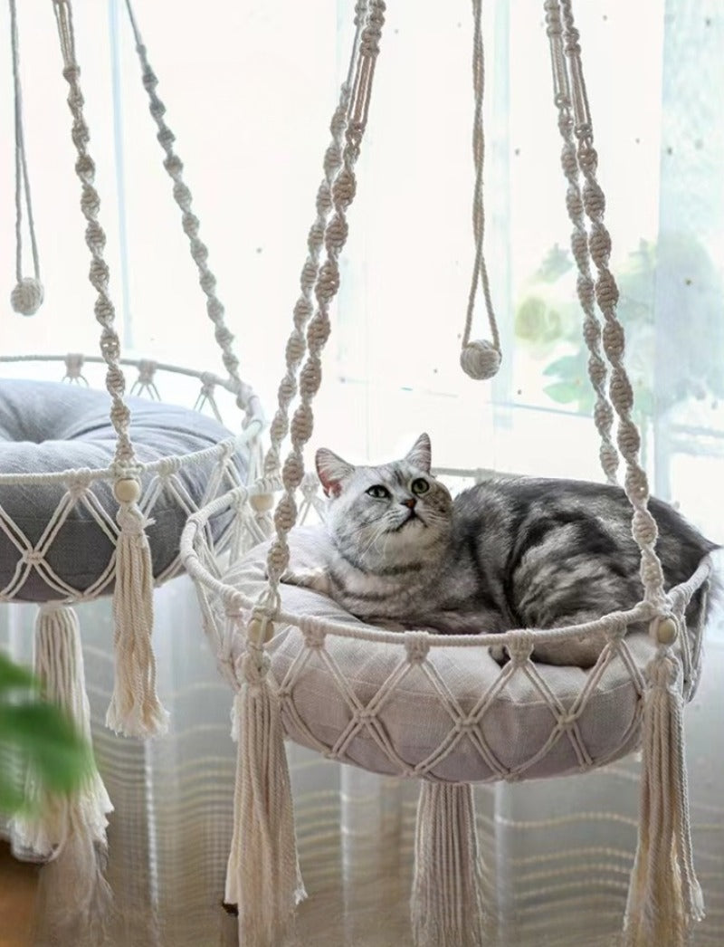 Hand-woven boho cat hammock swing with macrame design by Furvio Shop, featuring a cozy resting spot for cats.