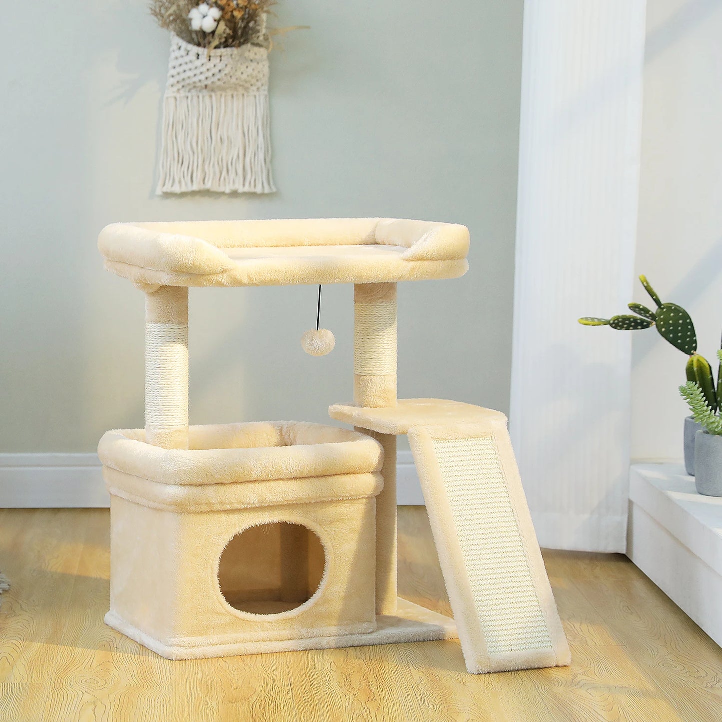 Compact 3-tier Furvio Shop cat tree with scratching pad, featuring multiple platforms and cozy perches for cats.