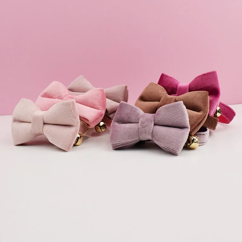 Luxury velvet cat collar with a bow tie from Furvio Shop, featuring a soft velvet strap and decorative bow for stylish feline accessories.