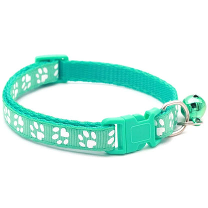 Reflective paw print breakaway collar for pets by Furvio Shop, featuring a secure buckle and reflective details for visibility.