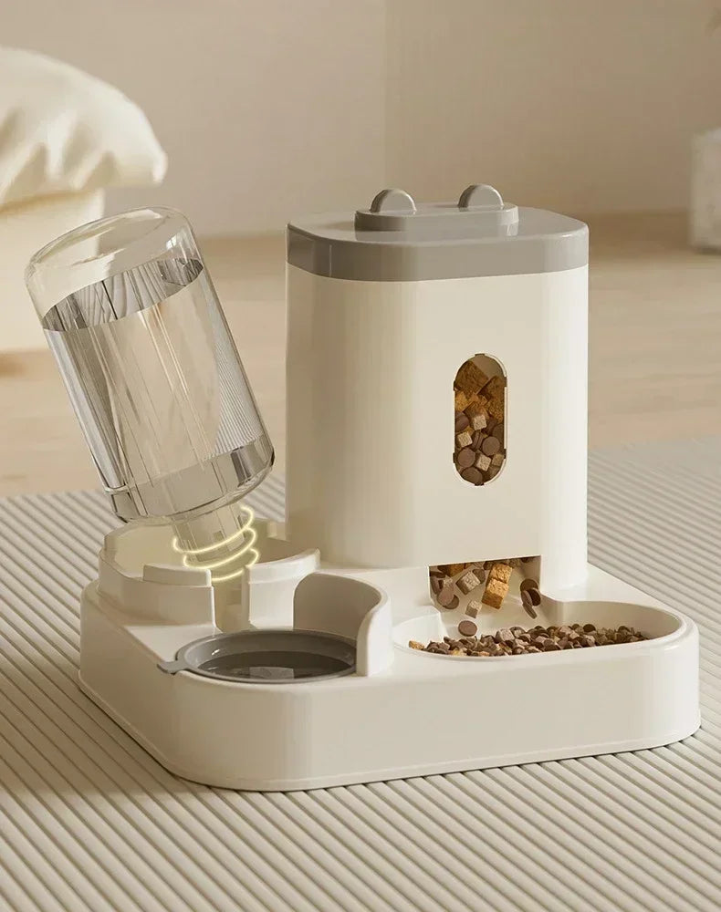 Furvio Shop 2-in-1 automatic pet feeder and water dispenser with clear food and water compartments for pets.