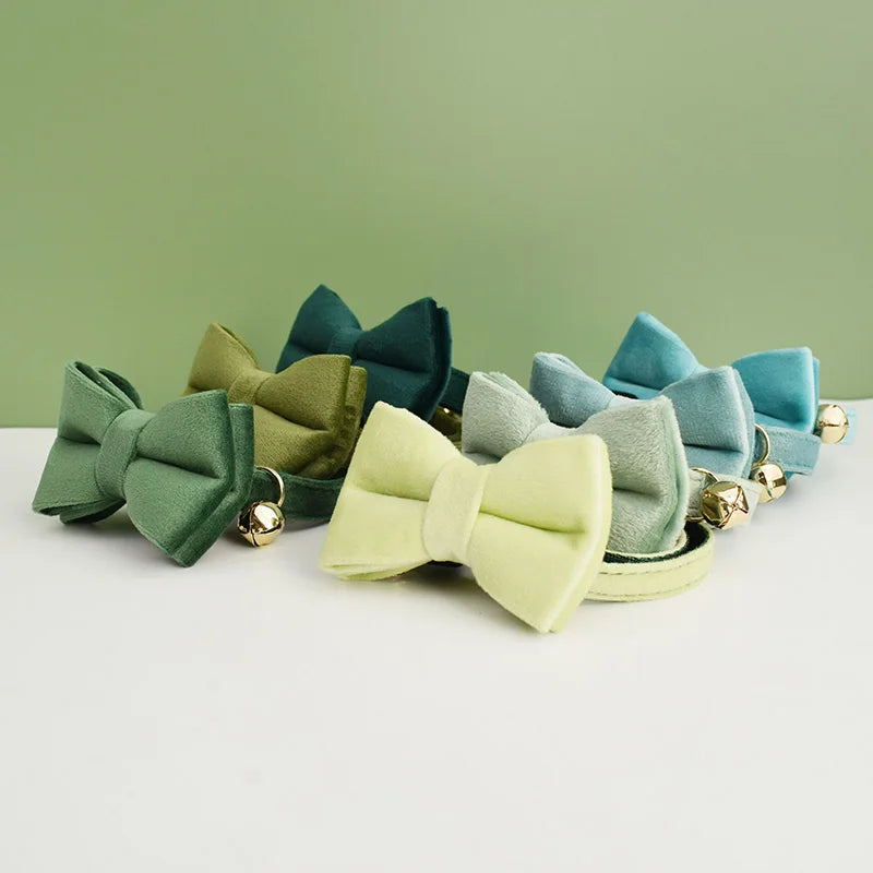 Velvet cat collar with bowknot, personalized Furvio Shop cat collar belt with bell, stylish feline accessory.