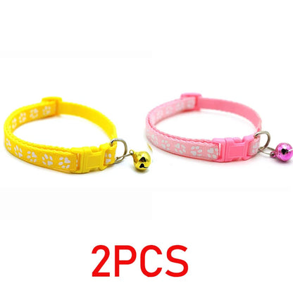 Reflective paw print breakaway collar for dogs by Furvio Shop, featuring a colorful paw print pattern on a nylon strap.