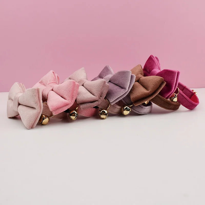 Luxurious velvet cat collar with a bow tie from Furvio Shop, featuring a soft texture and elegant design for stylish feline accessories.