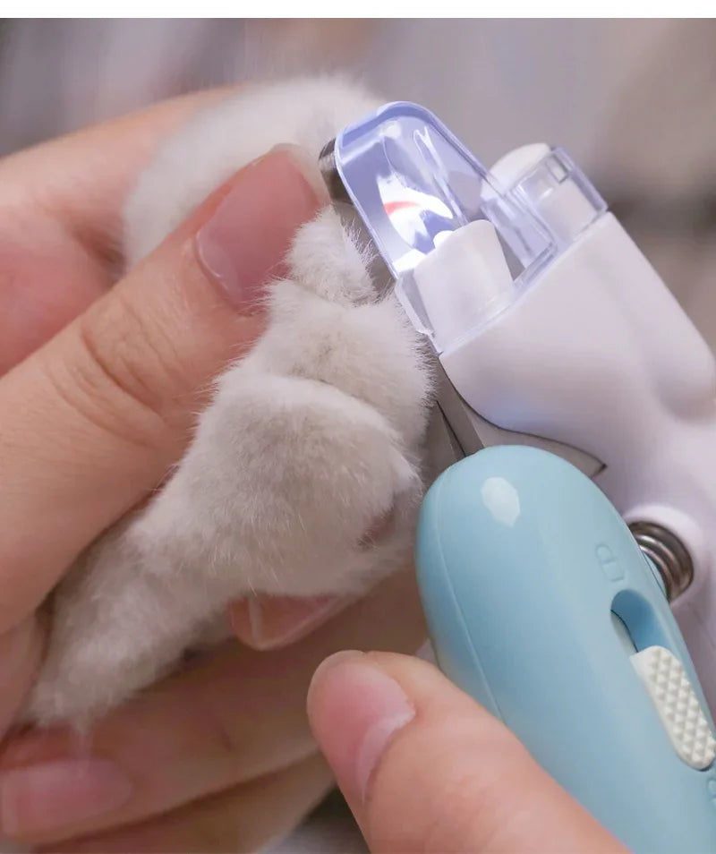 Illuminating LED Pet Nail Clippers by Furvio Shop showing sleek ergonomic design with built-in LED light for precise trimming.