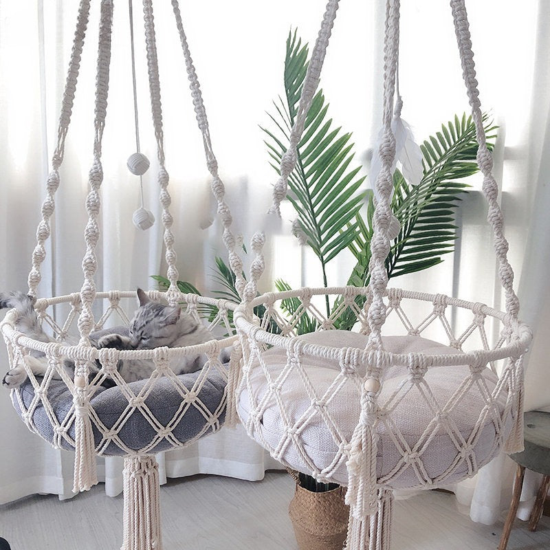 Boho macrame hand-woven cat hammock swing by Furvio Shop, showcasing a cozy, stylish hanging bed for cats with intricate knot details.