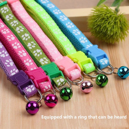 Reflective paw print breakaway collar for pets, featuring a colorful design and safety buckle, by Furvio Shop.