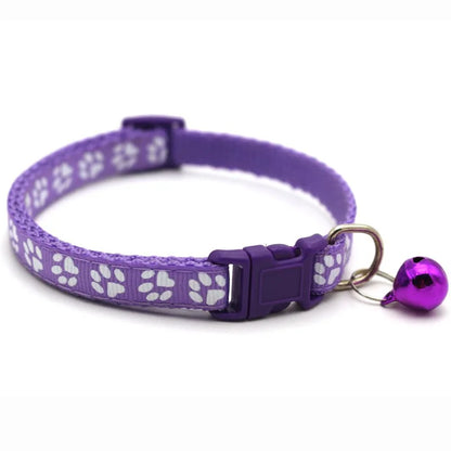 Reflective paw print breakaway dog collar with adjustable strap and safety buckle, branded by Furvio Shop.
