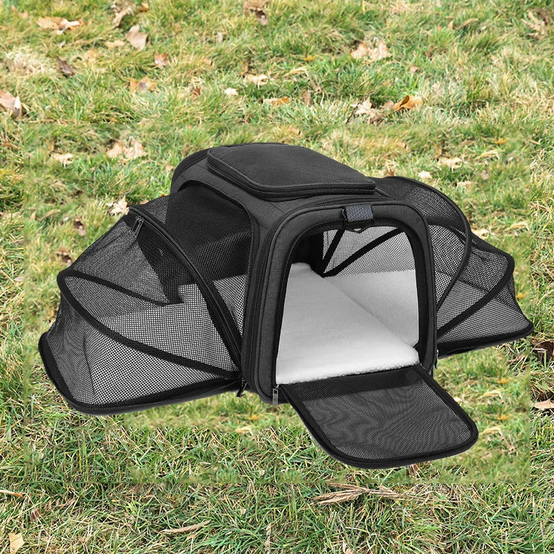 Expandable breathable pet carrier bag by Furvio Shop showing mesh sides, padded shoulder strap, and compact design for pets.