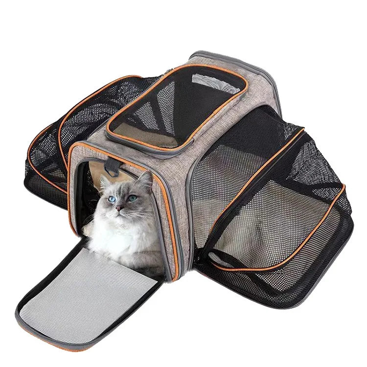 Expandable breathable pet carrier bag from Furvio Shop with mesh sides and sturdy handles for comfortable pet transport.