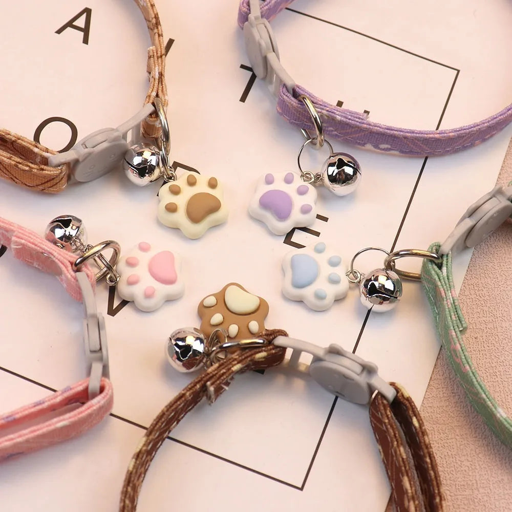 Patterned breakaway cat collar with bell from Furvio Shop, featuring colorful design and safety breakaway clasp.