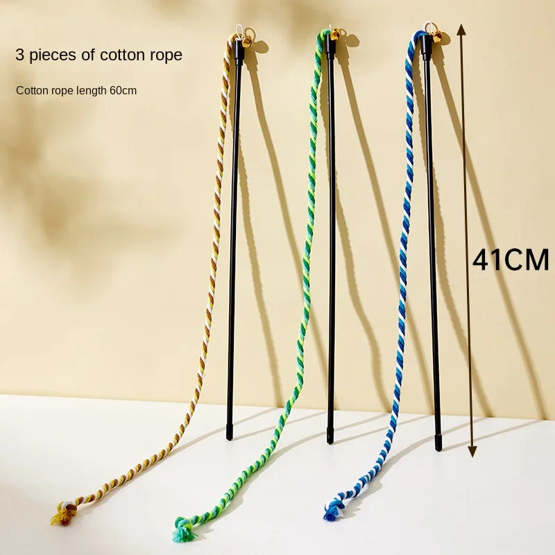 Interactive cotton rope and ribbon cat teaser wand from Furvio Shop, featuring colorful feathers and a long handle for playful fun.