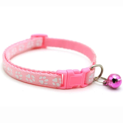 Reflective paw print breakaway collar for pets by Furvio Shop, featuring a secure buckle and reflective design for safety.