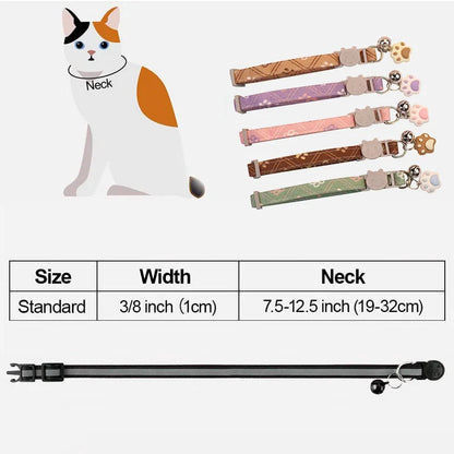 Patterned Furvio Shop breakaway cat collar with bell, featuring colorful designs and secure breakaway safety release.