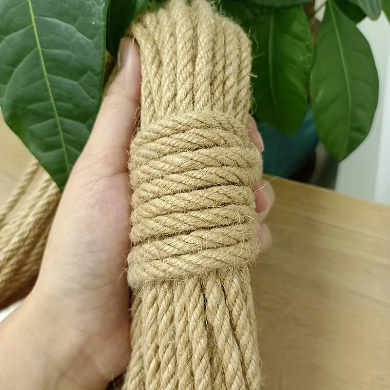 Natural sisal scratching rope by Furvio Shop, ideal for cats, showing a coiled sisal rope with a sturdy, natural fiber texture.