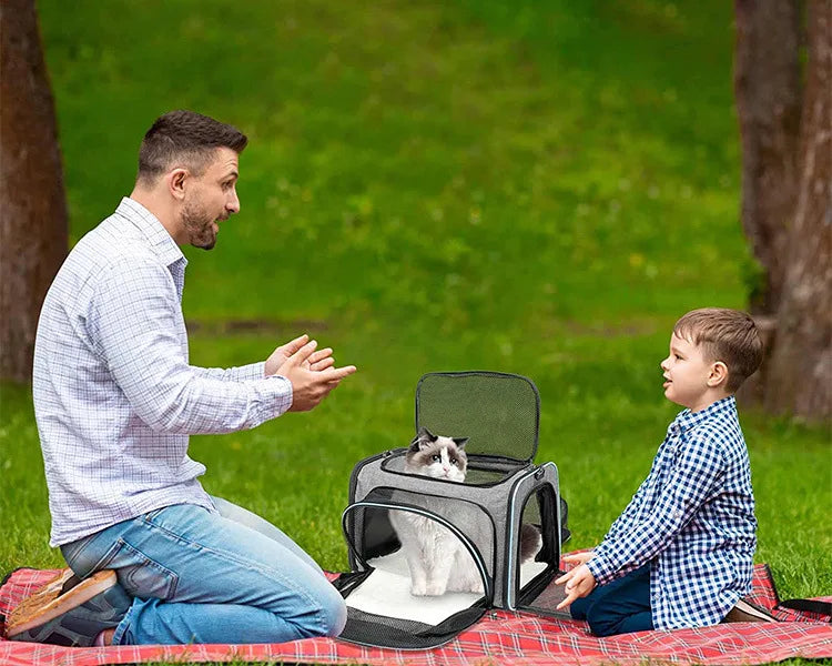 Expandable breathable pet carrier bag by Furvio Shop with mesh sides and padded shoulder strap for comfortable pet transportation.
