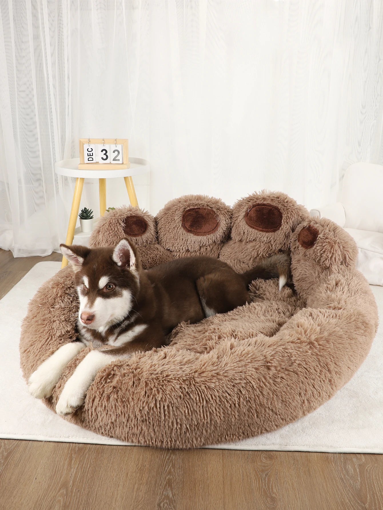 Ultra-soft plush paw-shaped pet bed by Furvio Shop, featuring cozy winter warmth and fluffy interior for small dogs or cats.