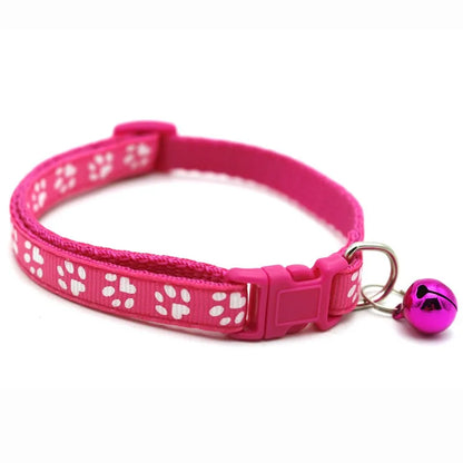 Reflective paw print breakaway collar for pets, adjustable with a safety buckle, by Furvio Shop.
