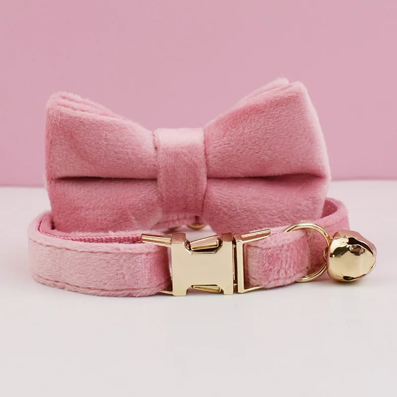 Luxury velvet cat collar with a bow tie from Furvio Shop, featuring a soft velvet strap and decorative bow for stylish feline accessorizing.