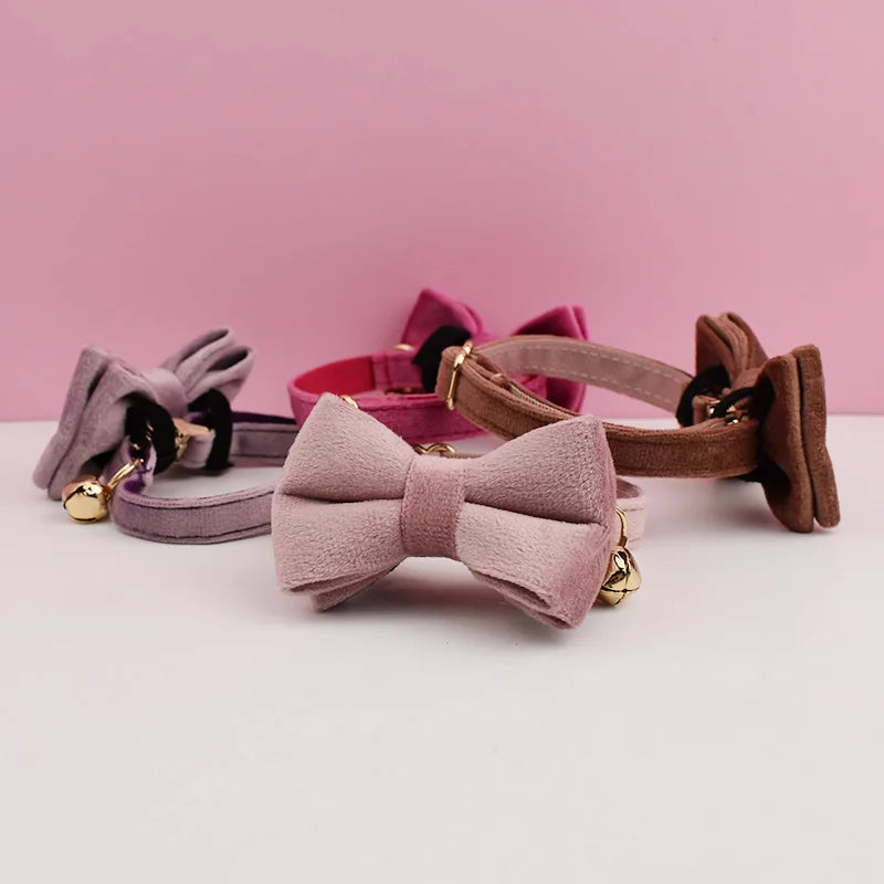 Luxury velvet cat collar with bow tie by Furvio Shop, featuring a soft velvet strap and decorative bow for stylish feline accessories.