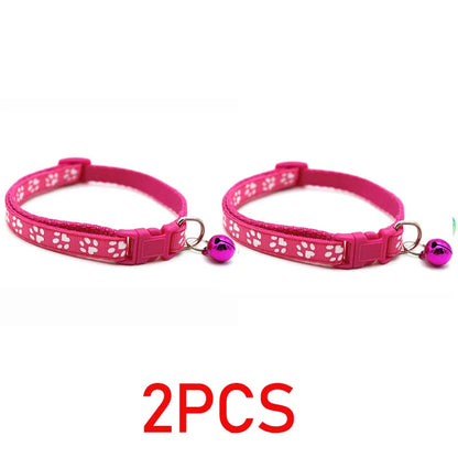 Reflective paw print breakaway collar for pets, featuring adjustable strap and safety buckle, by Furvio Shop.