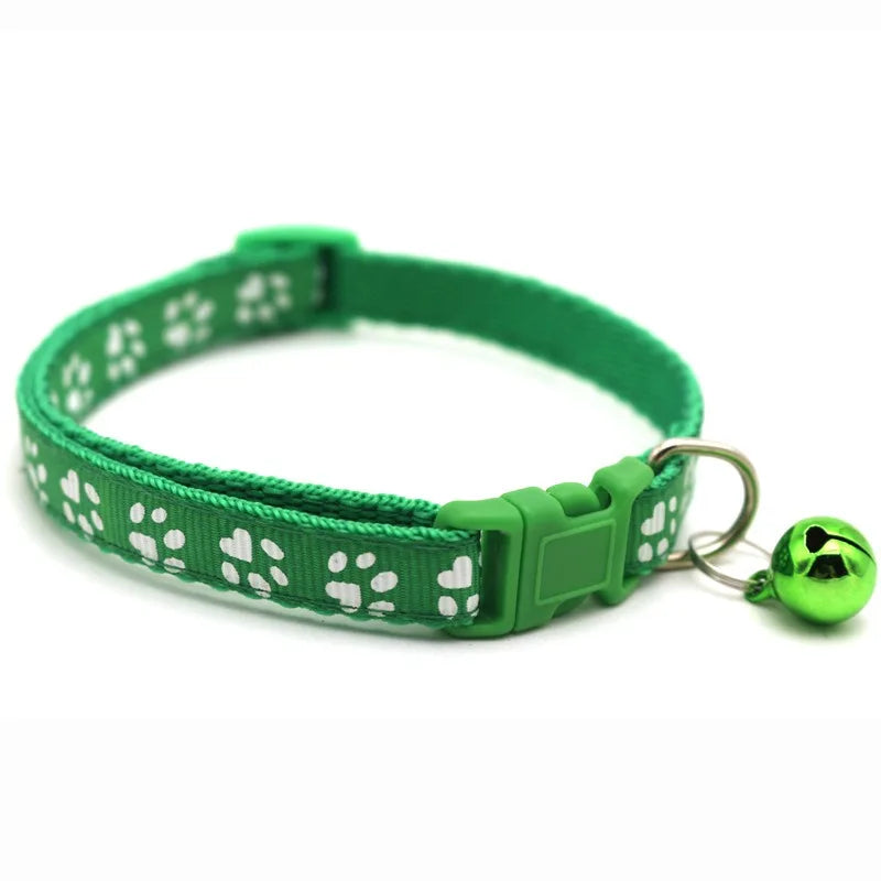 Reflective paw print breakaway cat collar with adjustable strap and safety buckle from Furvio Shop, designed for pet safety and visibility.