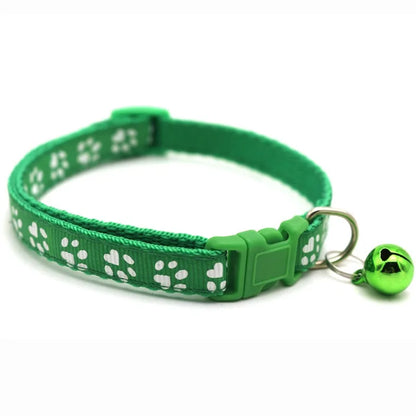 Reflective paw print breakaway cat collar with adjustable strap and safety buckle from Furvio Shop, designed for pet safety and visibility.