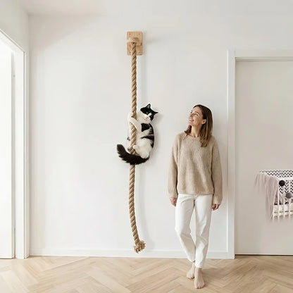 Wall-mounted minimalist cat climbing rope by Furvio Shop, featuring natural sisal rope and sleek wooden mounting brackets.