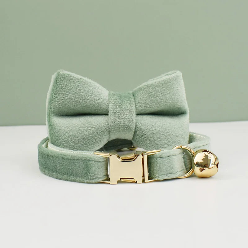 Velvet cat collar with bowknot and bell, personalized Furvio Shop cat collar belt, stylish and comfortable for feline pets.