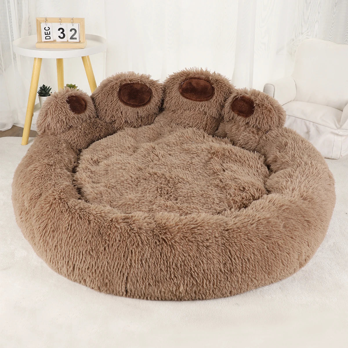 Ultra-soft plush paw pet bed by Furvio Shop featuring a cozy winter design with fluffy, warm cushioning for pets.