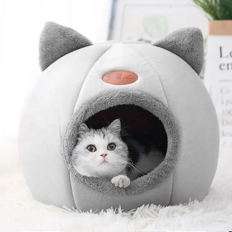 Furvio Shop 2-in-1 cat cave bed and nest with warm plush interior, designed for cozy feline comfort and resting.